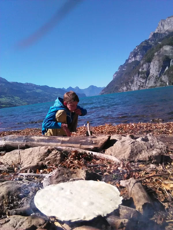 Cooking lunch on the beach, Switzerland